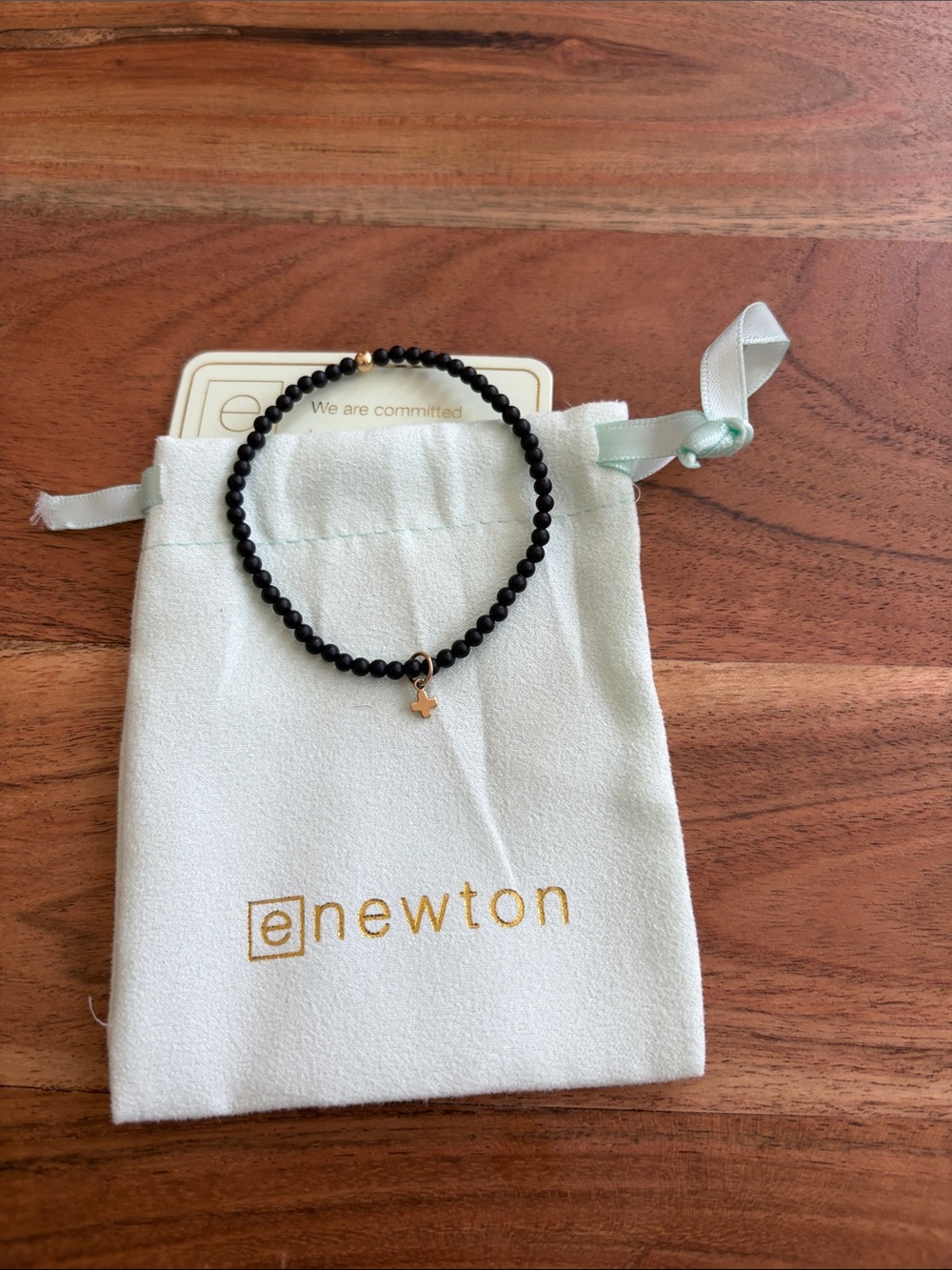 eNewton Black Beaded Bracelet with Small Gold Cross Charm